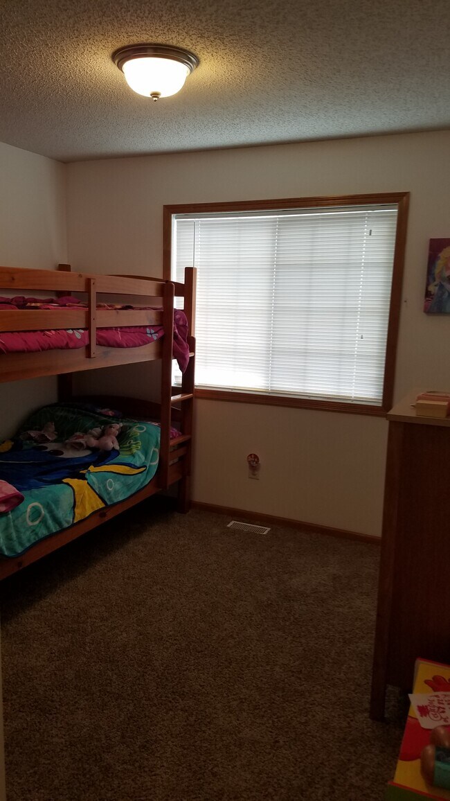Second Bedroom from hallway. Upper Level. - 17195 Monroe Drive NW