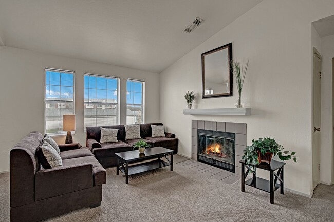 St. James Place Fireplace with Couches, Fireplace, and Window - St. James Place