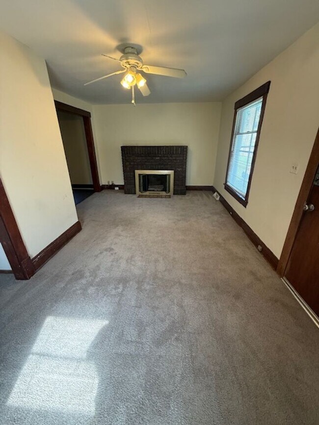 Building Photo - Comfortable Corner-Lot with Main Floor Pri...