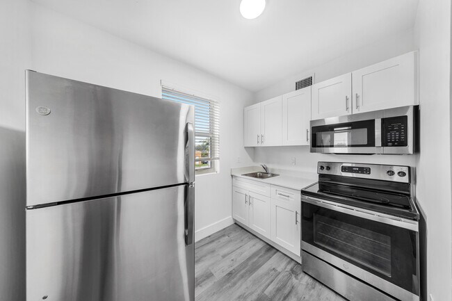 Building Photo - 6040 NW 12th Ave