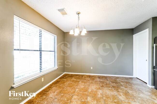 Building Photo - 6907 Saharastone Dr