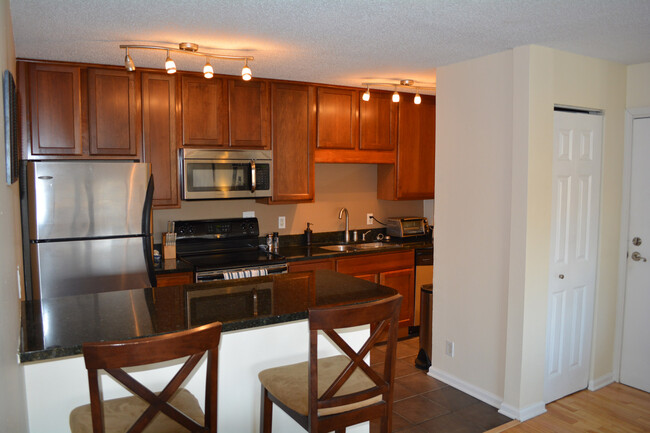Kitchen with Granite Countertops and Stainless Steel Appliances - 1800 Lasalle Ave
