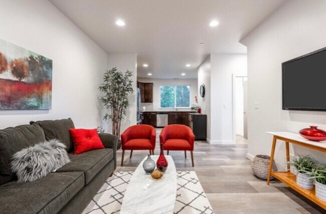 Building Photo - Spacious 3-Story at a Modern Community Fea...