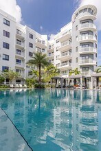 Resort style swimming pool with cabanas - AMLI Park West