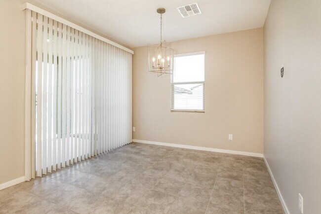 Building Photo - 6842 W Marguerite Ave
