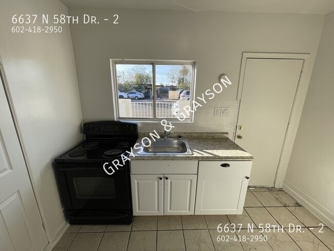 Photo - 6637 N 58th Dr Apartment