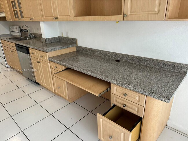 Building Photo - 10210 Collins Ave