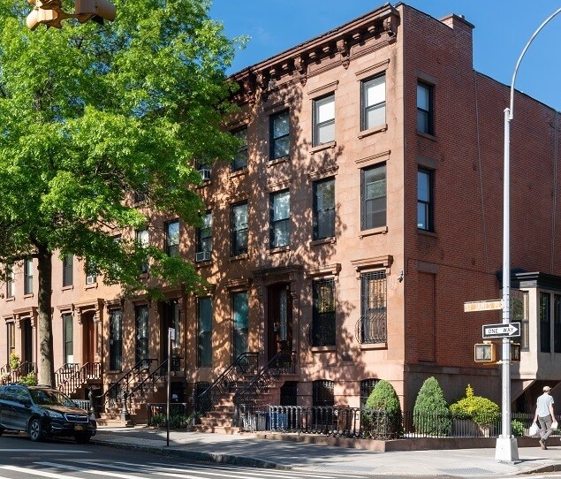 Brownstones along the tree-lined Saint James Place
