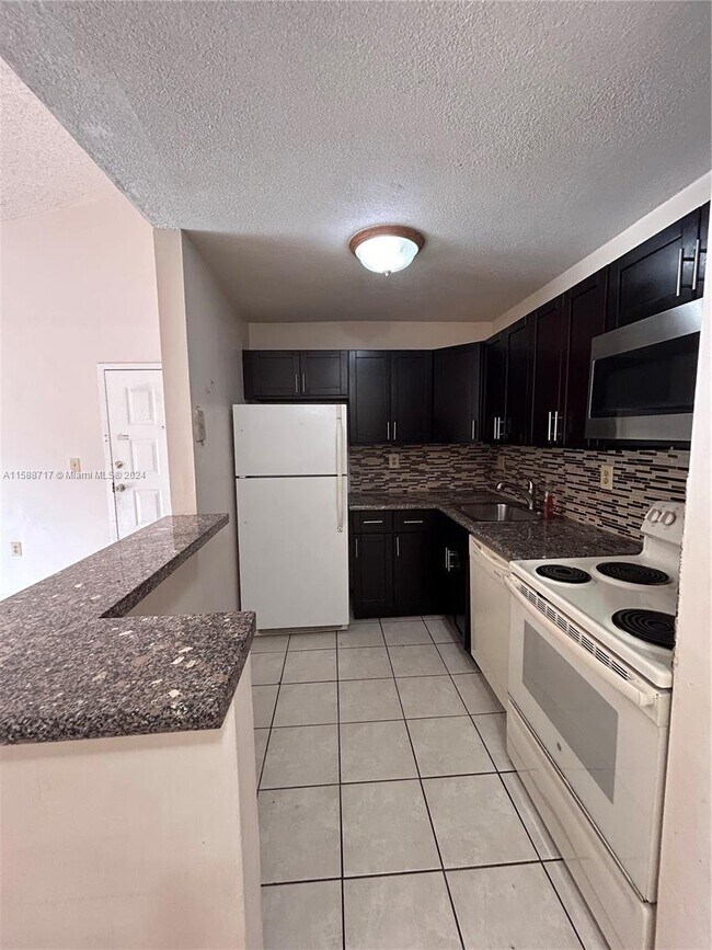 Building Photo - 15630 Southwest 80th Street Apt #I-305, Mi...