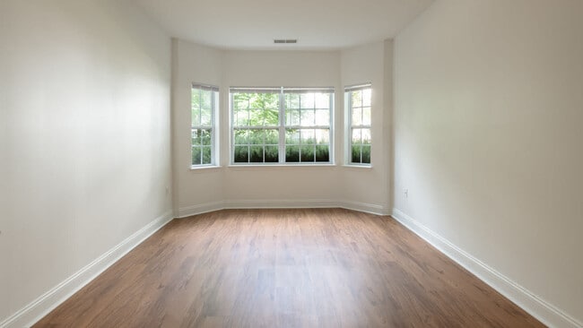 Bedroom with Hard Surface Flooring - Heritage at Stone Ridge