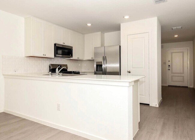 Building Photo - 1408 Merlin Blf St