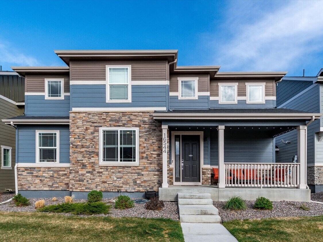 Primary Photo - Spacious 4 Bedroom Maintenance Free Home i...