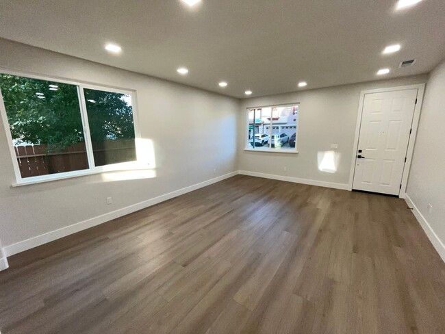 Building Photo - Fully Remodeled with Many Upgrades, A Must...