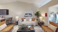 Located at 3062 12th Ave SE in Hickory, NC, this single-story, 2-bedroom, 2-bathroom home offers a thoughtfully designed layout with modern finishes throughout. The welcoming entrance leads into an open living room with durable wood-style flooring, a ceiling fan, and generous natural light — with a clear sightline connecting to additional living areas. The kitchen is well-equipped with rich dark-espresso cabinetry, granite-look countertops, and a full suite of stainless steel appliances, including a refrigerator, electric range, microwave, and dishwasher, complemented by wood-style flooring. Both bedrooms are carpeted for comfort, feature ceiling fans, and receive natural light through large windows with blinds. The spacious primary bedroom includes direct access to a closet and an en-suite bathroom. The two bathrooms are finished with dark vanity cabinetry, granite-look countertops, and wood-style flooring — one offering a shower-tub combo and the other a walk-in shower. The attached garage is notably spacious, featuring a glass-panel roll-up door that allows natural light in, an automatic opener, a side entry door, and ample room for storage or a golf cart.