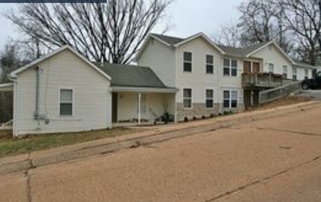 Upper left unit. Second door from right side - 309 Fletcher St