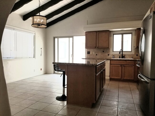 Kitchen going to sun room - 5325 Surfrider Way