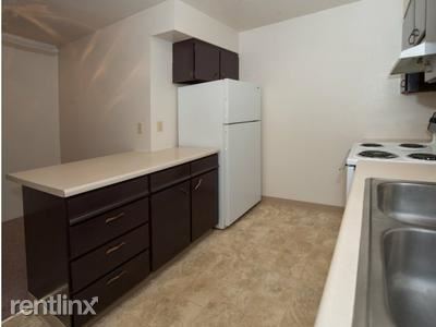 Building Photo - 625 W 46th Ave