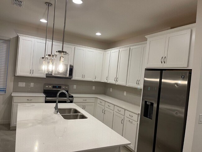 Building Photo - COMPASS LANDINGS  4 BEDROOM, 2.5 BATHROOM ...