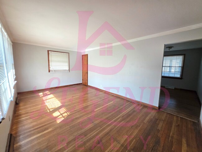 Photo - Move-In Ready 2 Bed Home with Sunroom, Garage & Fenced Yard