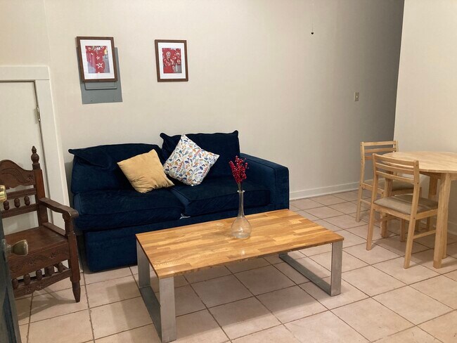 living room with sofa bed - 570 Walnut St
