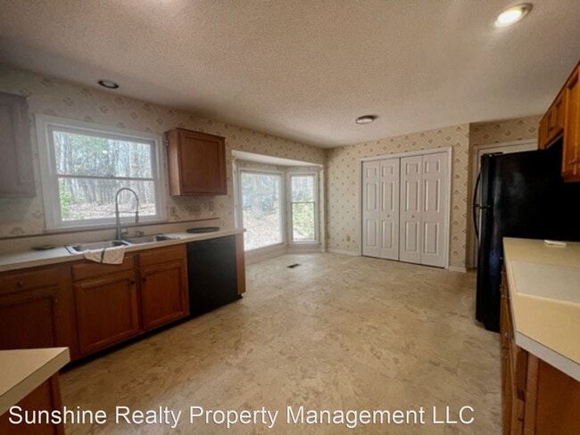 Building Photo - 4 br, 2.5 bath House - 3609 Riverwood Ct