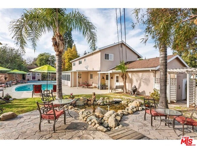 Building Photo - 8031 Melba Ave