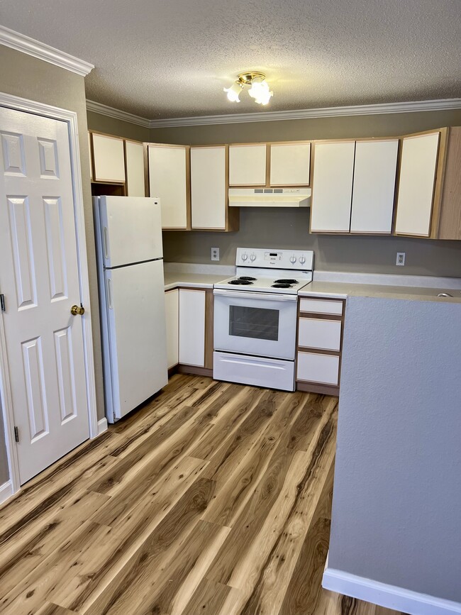 KITCHEN VIEW WITH PANTRY - 909 Kansas St