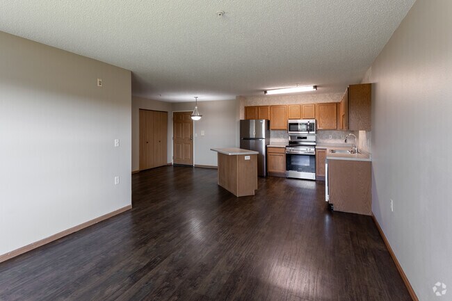 3 habitaciones, 1 baño - 1088 pies cuadrados - Sala de estar - Boulder Ridge Apartment Homes