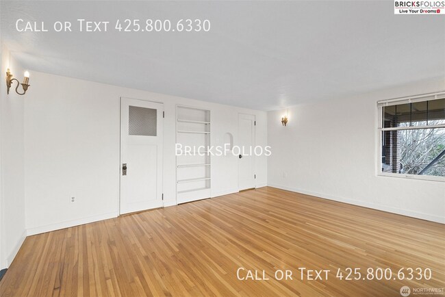 Foto del edificio - Charming Tudor Retreat: Your Perfect Home ...