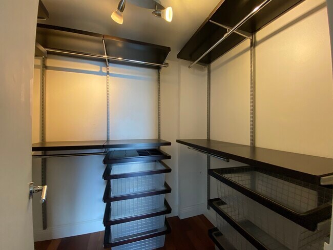 Bedroom walk-in closet - 7928 West Dr