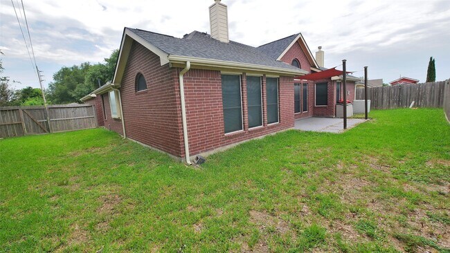 Foto del edificio - 10402 Indian Paintbrush Ln
