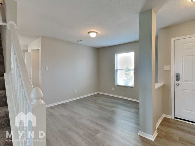 Foto del edificio - 8431 Adams Mills Pl