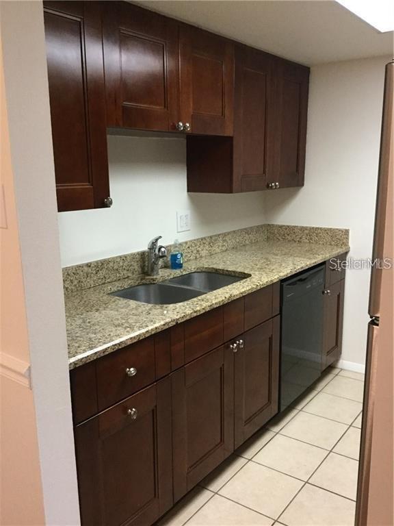 Building Photo - 5999 Village Cir N