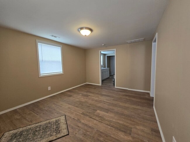 Building Photo - Corner Lot. Fenced Yard. Smells Like Fresh Paint & Good Decisions