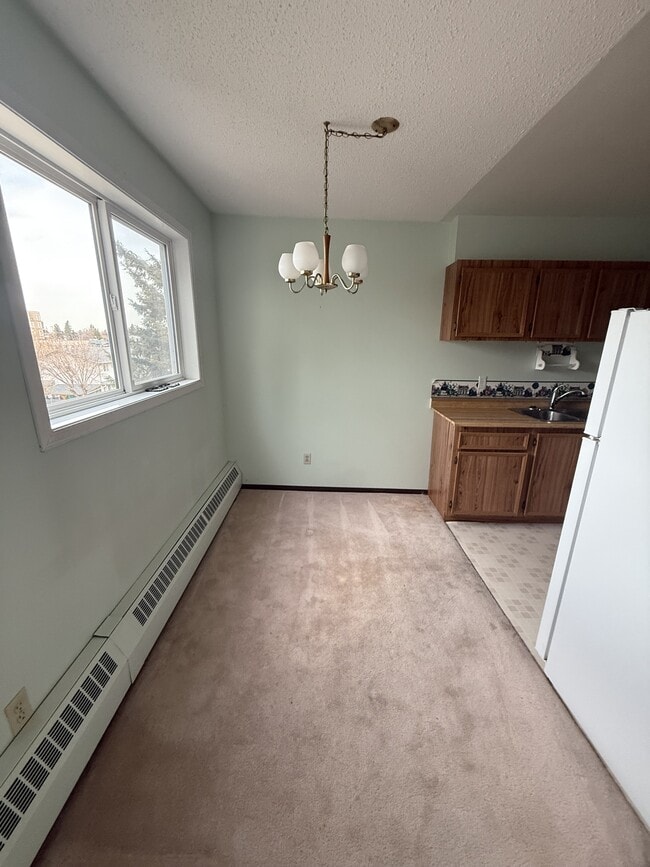 Photo du bâtiment - 301-911-310 10 St