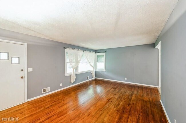 Building Photo - 4 br, 2 bath House - 7208 Cartisian Avenue