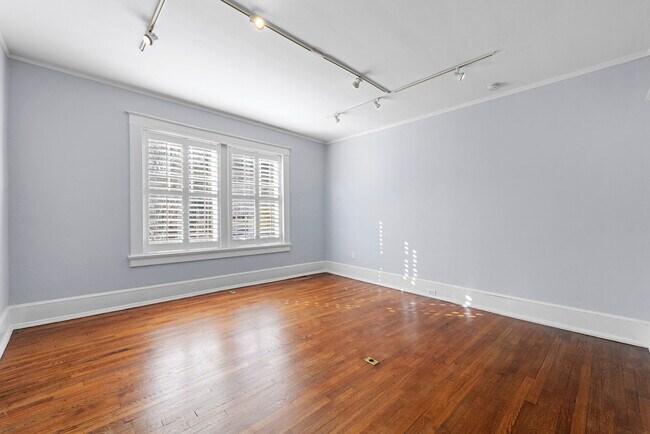 Spacious, light-filled living room. - 3 Park Ln NE
