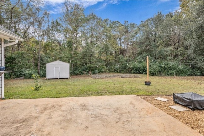 Building Photo - 8171 Woodland Hills Dr