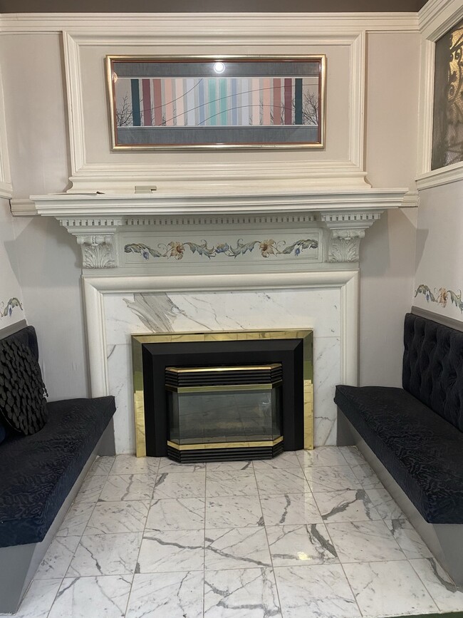 Fireplace and seating - 24 S River St