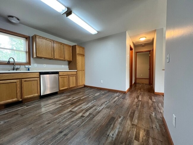 Building Photo - Spacious 3BR Duplex with Finished Basement & 2-Car Garage in Otsego