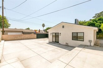 Building Photo - 10446 Woodley Ave