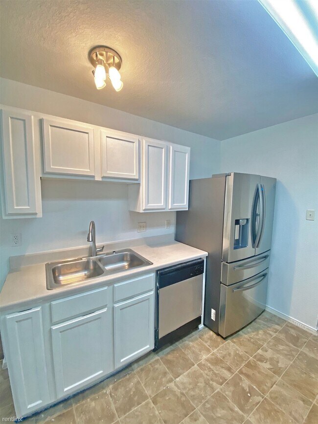 Building Photo - 4 br, 2 bath House - 3400 Woodlake Dr