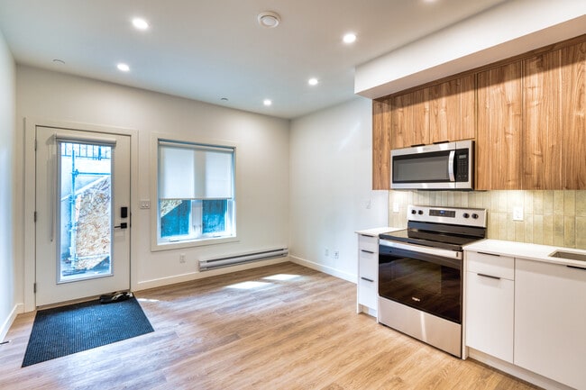 Building Photo - Move-In Special! Modern 1-Bedroom Basement Suite in Highland Park | Pet Friendly
