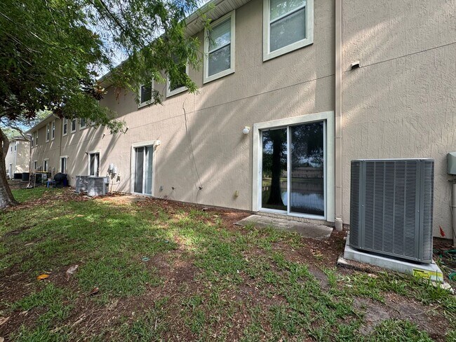 Building Photo - Available Now! Westside Timothy's Landing 2/2.5 Townhome with a 1-Car Garage