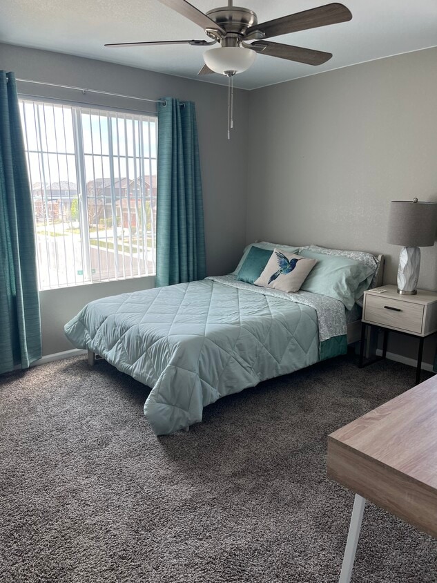 Green Room with Solid Vinyl Verticals and Room Darkening Curtains - 19909 E 61st Dr (Aurora, CO)