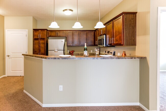 2 HAB, 2 BA: 1,140 ft² - The Ponds at Heritage Place