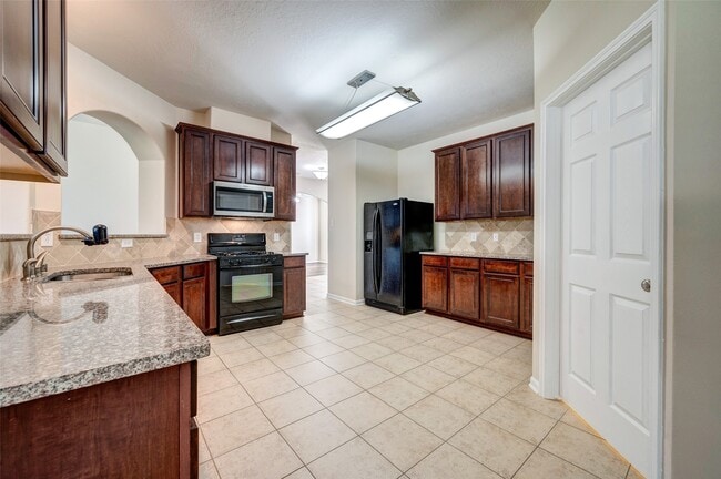 Building Photo - 7414 Compass Rose Dr