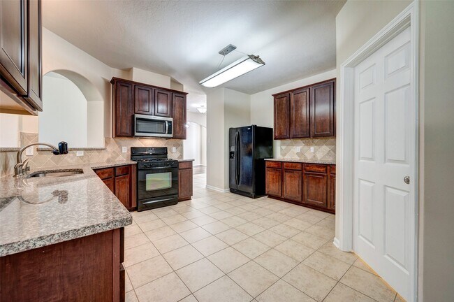 Foto del edificio - 7414 Compass Rose Dr