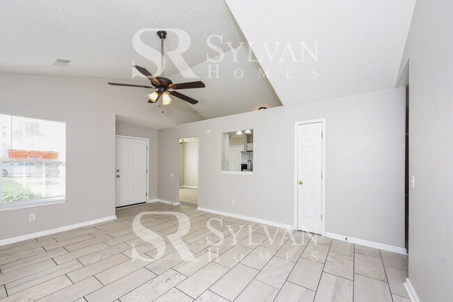 Building Photo - Welcome to this charming abode.