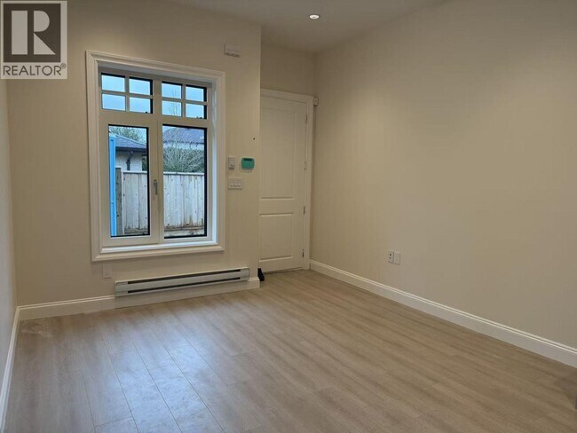 Photo du bâtiment - 1115 W 48th Ave